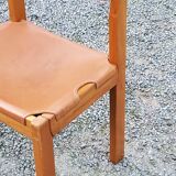 Pair of brutalist chairs in elm and stretched leather with saddle stitching Self publisher