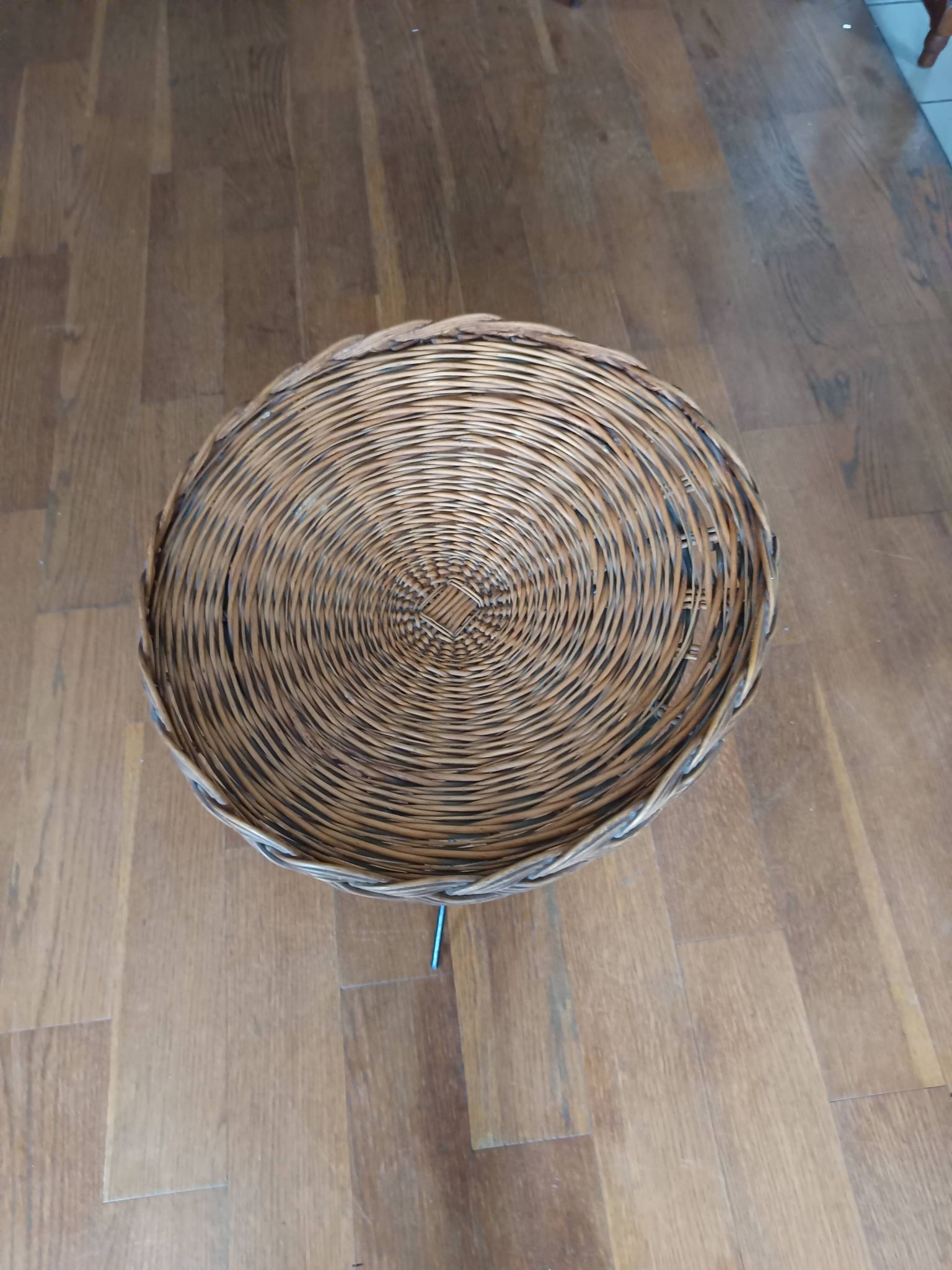 vintage wicker gueridon with a black metal tripod base from the 1960s