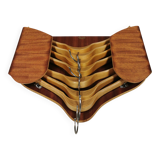 Very beautiful vintage hanger holder, including 7 matching hangers.