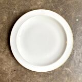 Plat rond A. Vignaud en porcelaine de Limoges blanche et dorée