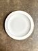 Plat rond A. Vignaud en porcelaine de Limoges blanche et dorée
