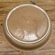 A trompe l’oeil strawberry pie dish