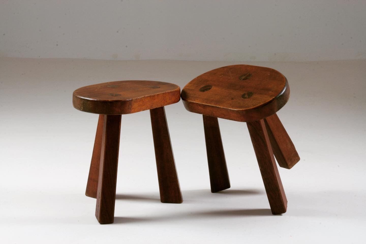 Pair of tripod brutalist stools, France 1950s
