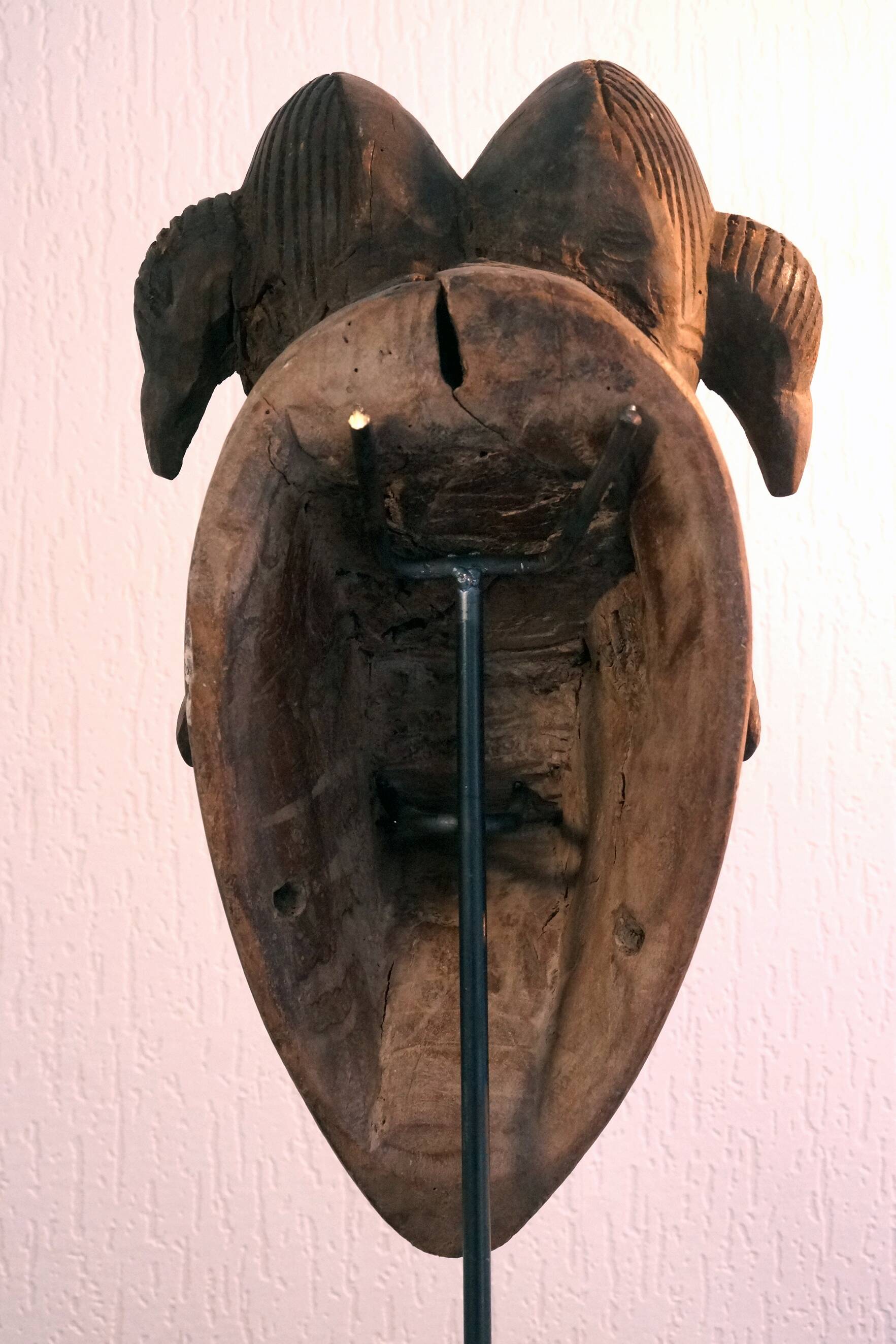 Punu mask on a base