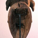 Punu mask on a base