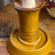Candle holder-style lamp made entirely of ceramic.