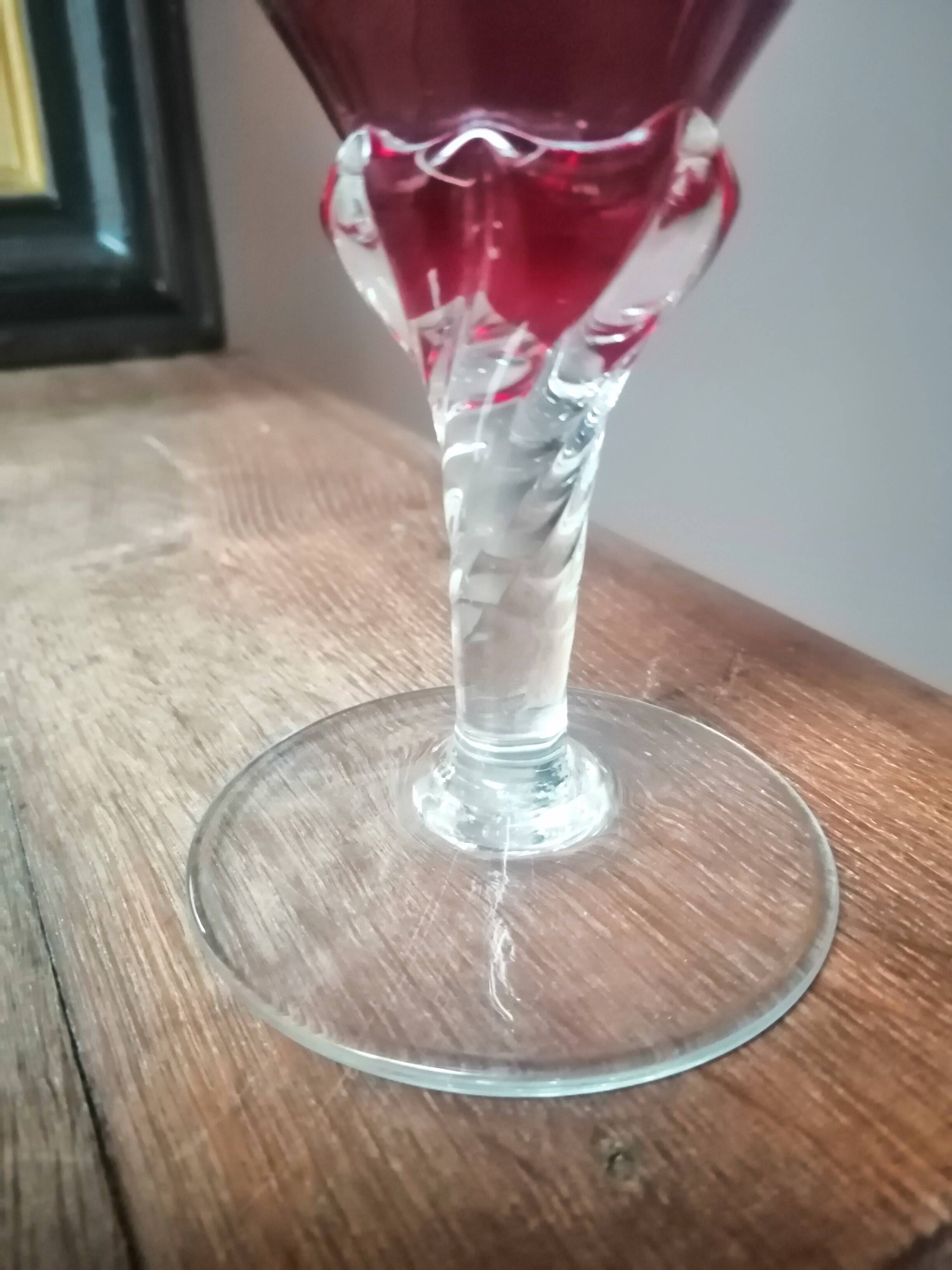 Red vase with gold decoration