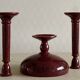 Candlesticks and bowl in speckled ceramic.