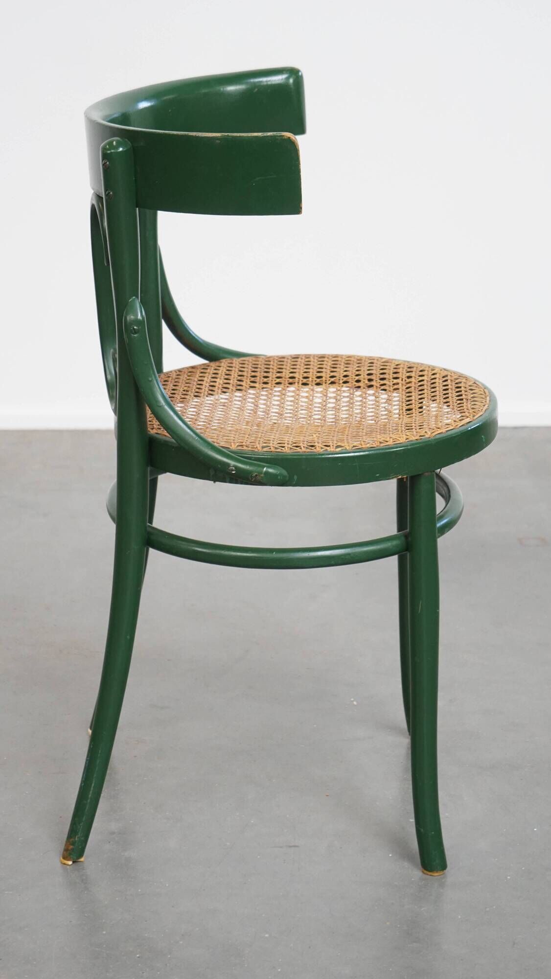 Vintage green bistro chair with woven reed seat