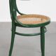 Vintage green bistro chair with woven reed seat
