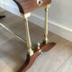 Neoclassical coffee table in wood, brass and leather