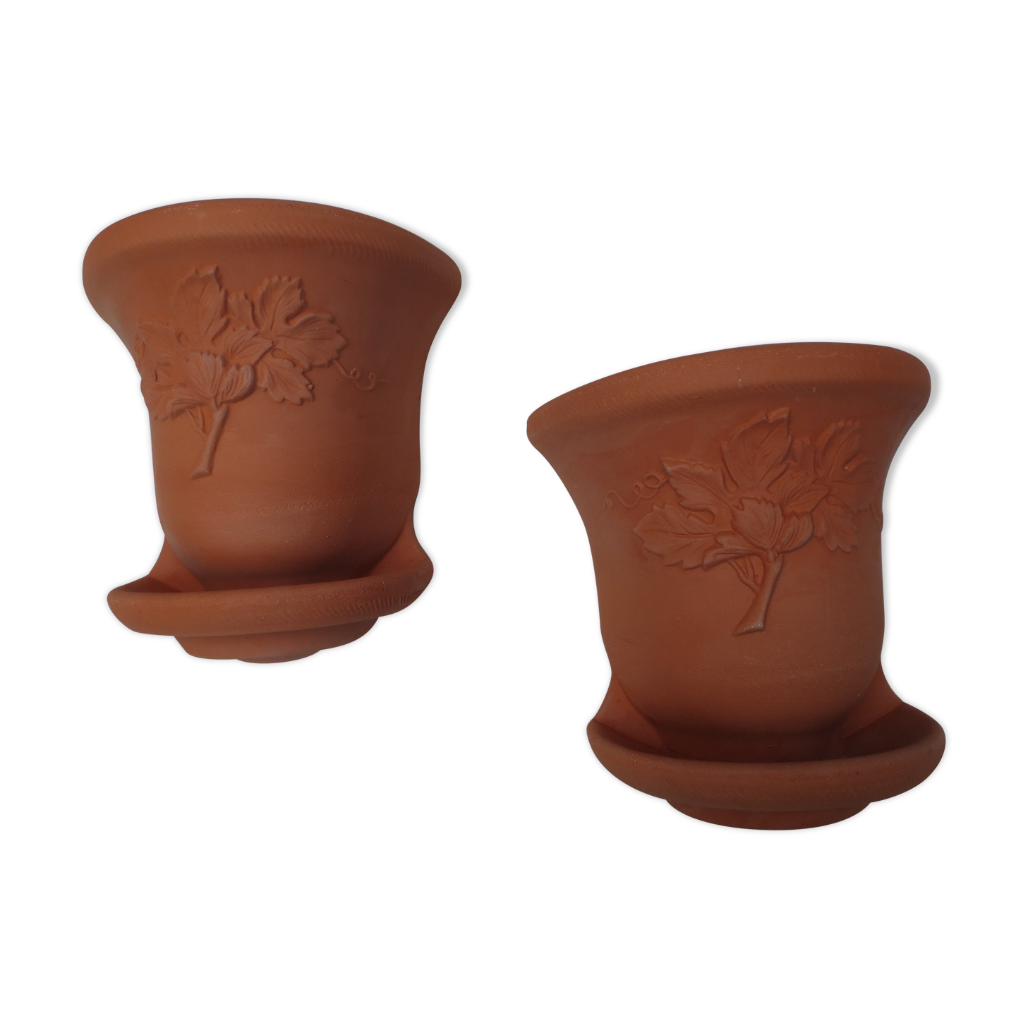 Pair of decorated terracotta wall flower pots