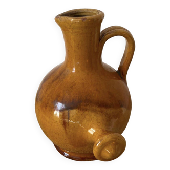 Provençal jug in orange/caramel glazed earthenware