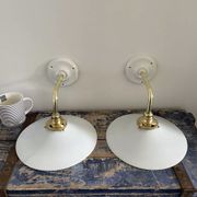 Set of two electrified white opaline wall lamps to nine