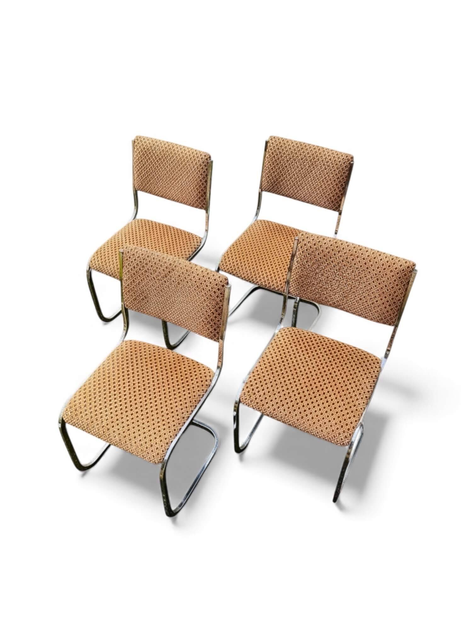 Set of 4 vintage sled chairs from the 1970s