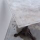 Bistro pedestal table in marble and cast iron lion paws