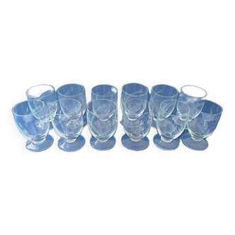 Set of twelve glass vodka glasses engraved with stylized ears of corn