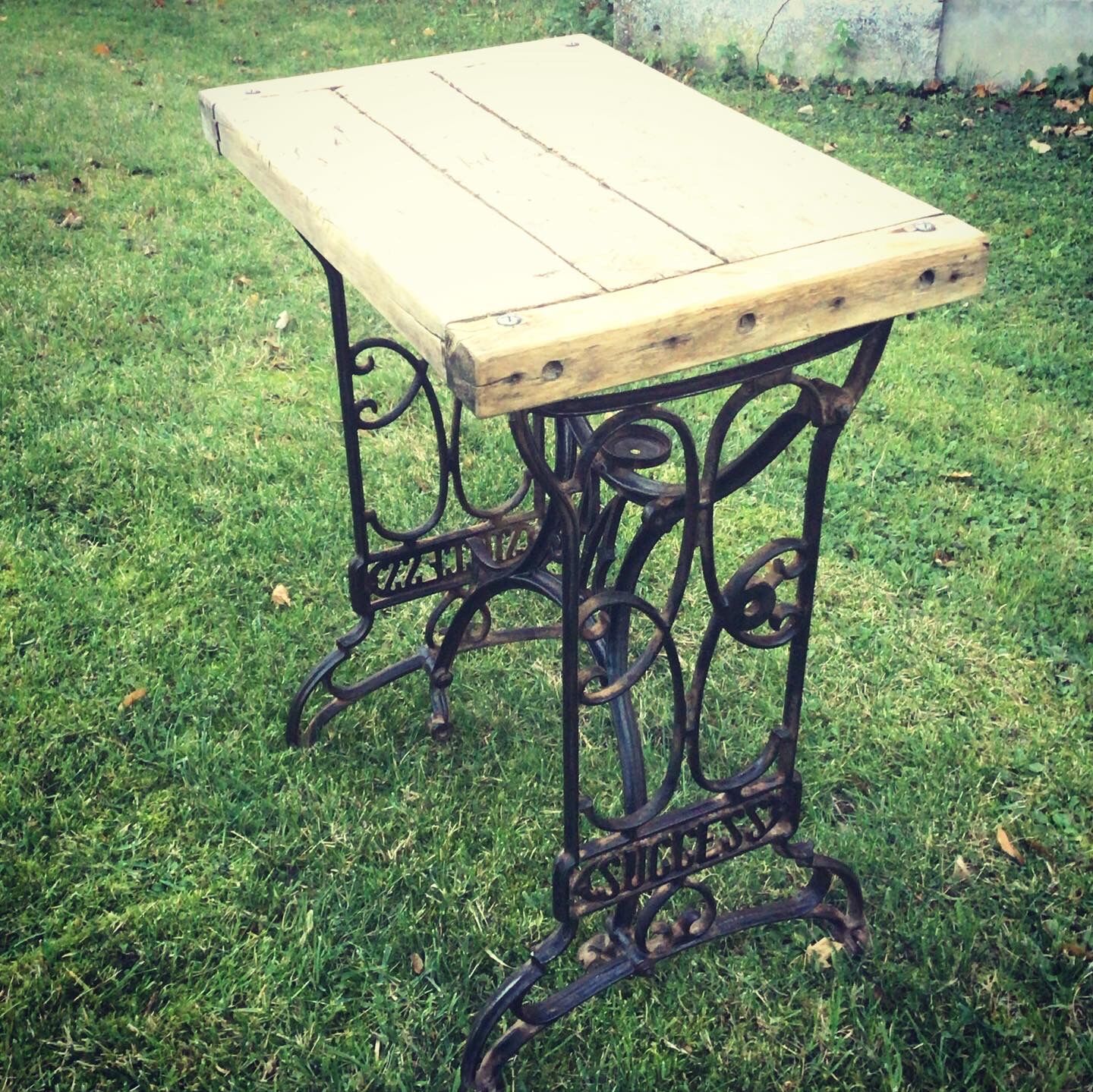 Established solid wood and cast iron console