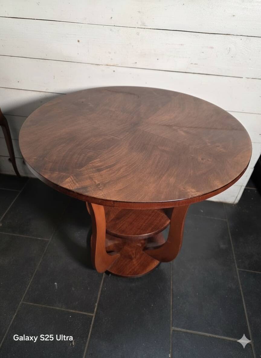 Art Deco walnut gueridon with double top from the 1930s.