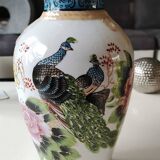Chinese polychrome porcelain base. Peacock/birds of paradise designs. Corolla-shaped collar with ribbon. 30 x 15 cm