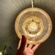Vintage globe pendant light in bubbled amber glass