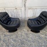 Paire de fauteuils vintage pivotants en cuir noir pied tulipe