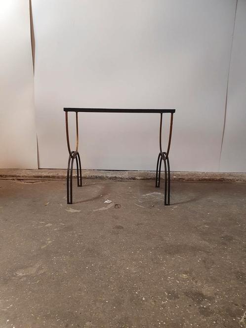 Vintage cast iron and black glass side table