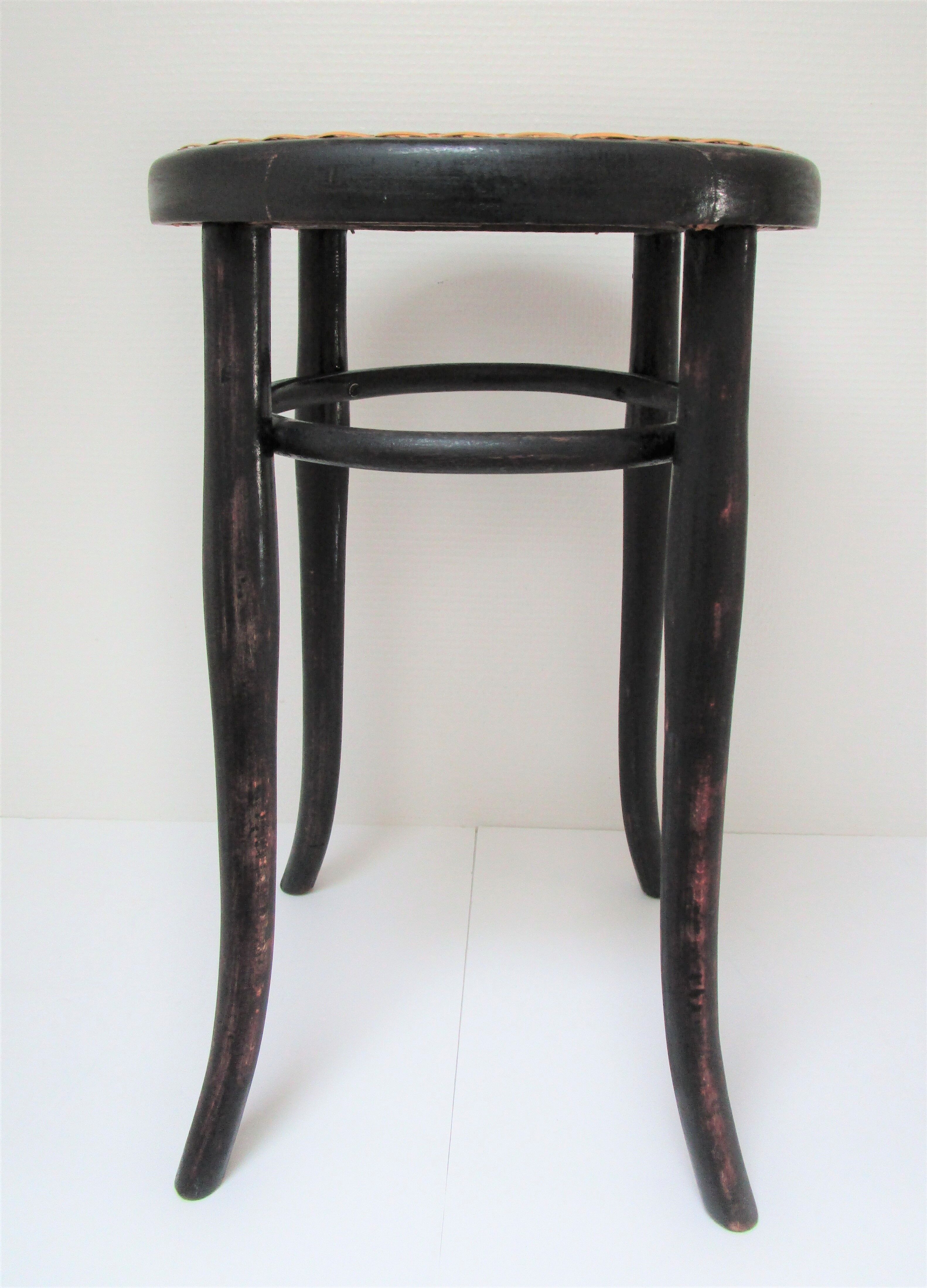 Black skated Thonet stool stamped