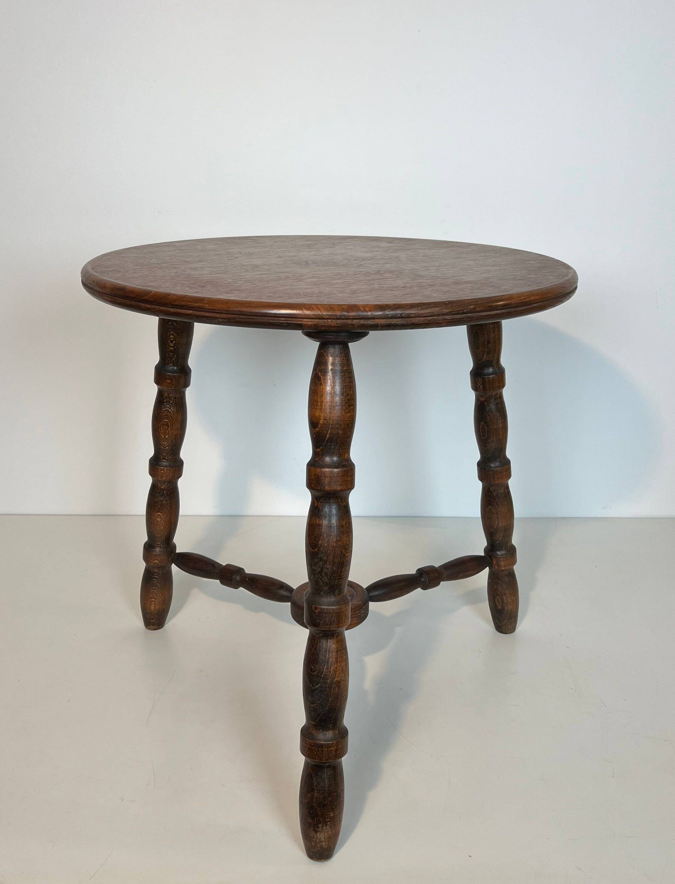 Turned wood coffee table by Charles Dudouyt