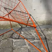 Orange lattice armchair