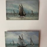 A pair of old paintings on wood.