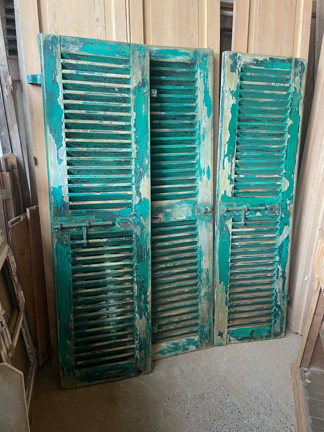 Old green shutter blinds