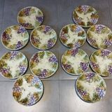 Set of 12 antique earthenware plates in slip with grapes and vines