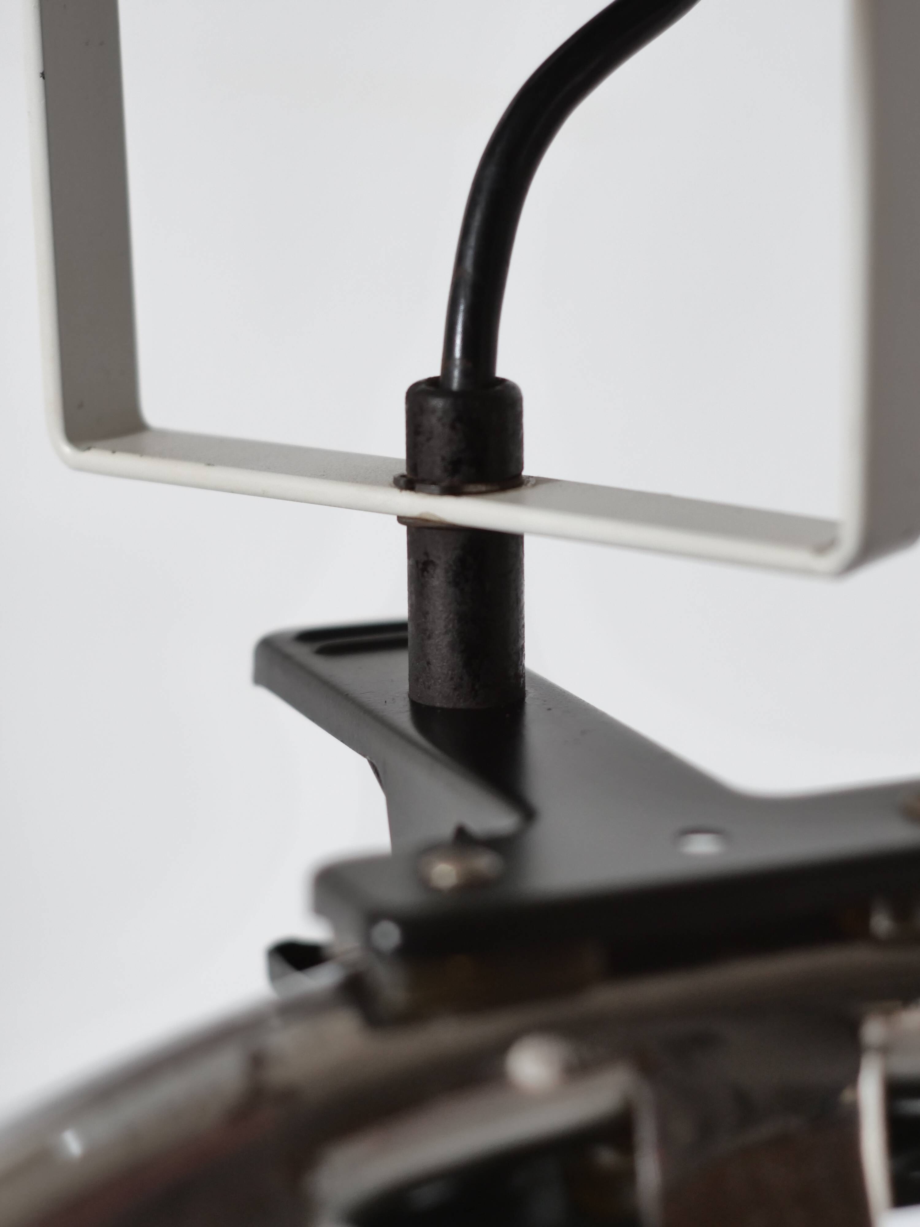 Artemide clamp lamp designed by Ernesto Gismondi model Sintesi
