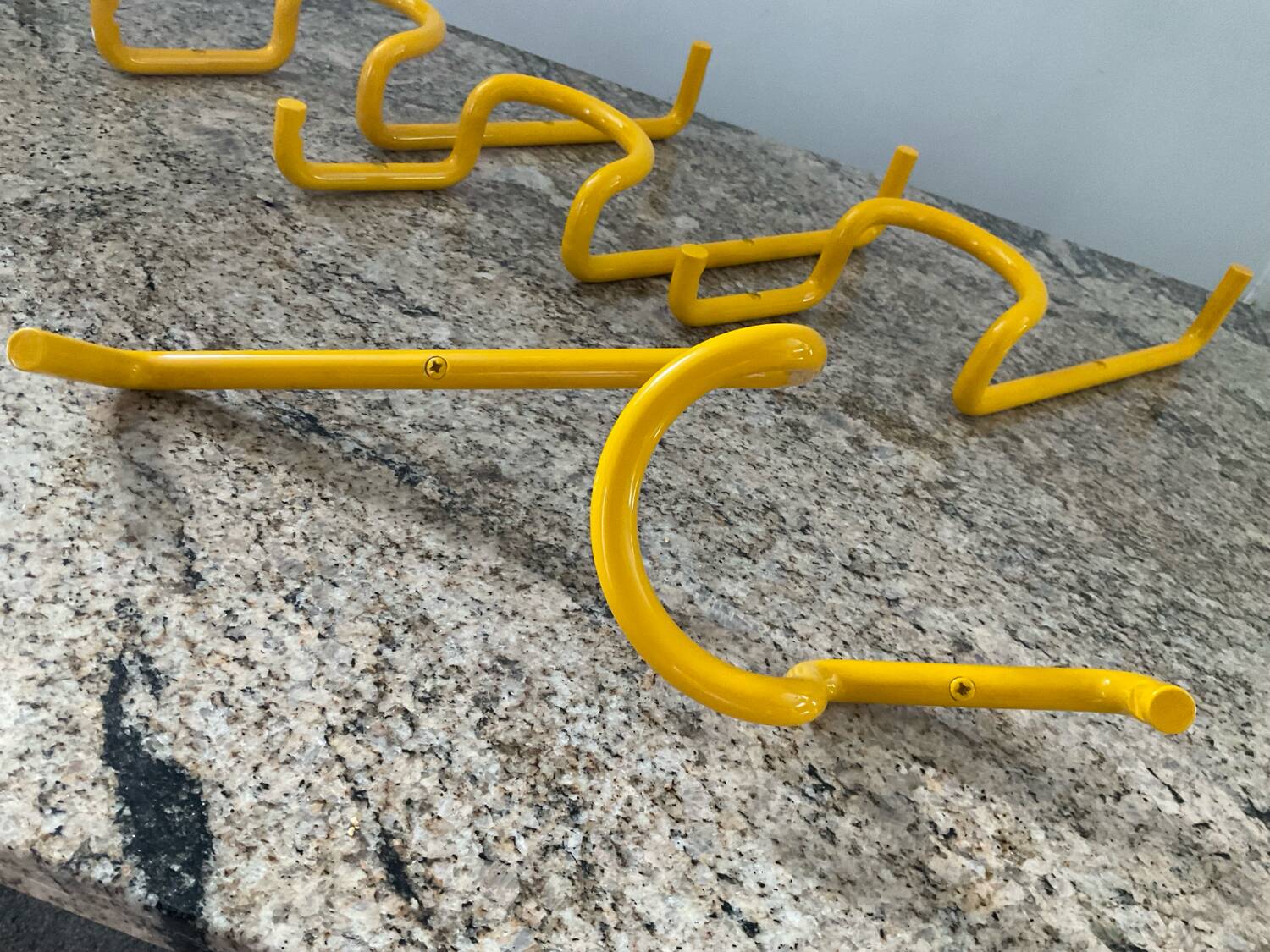 Series of 4 “Taka” hooks by Cesar Rota Nodari Acerbis