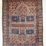 Tapis ancien noué main numéroté
