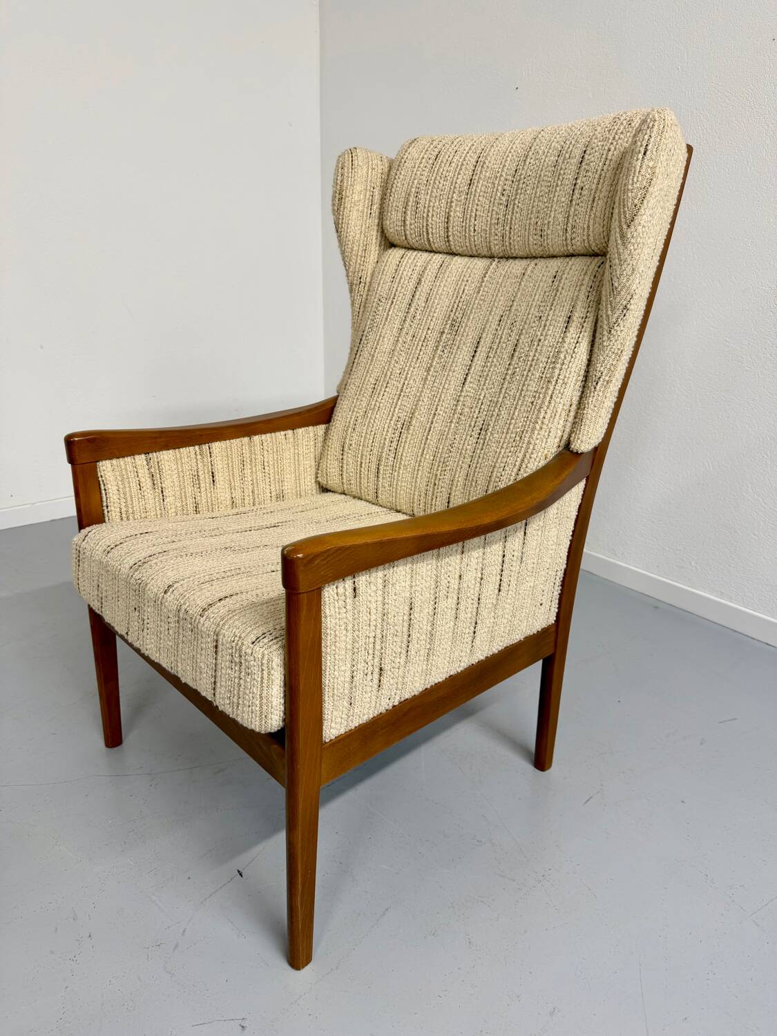 Vintage Casala wingback armchair with ottoman, 1970s design