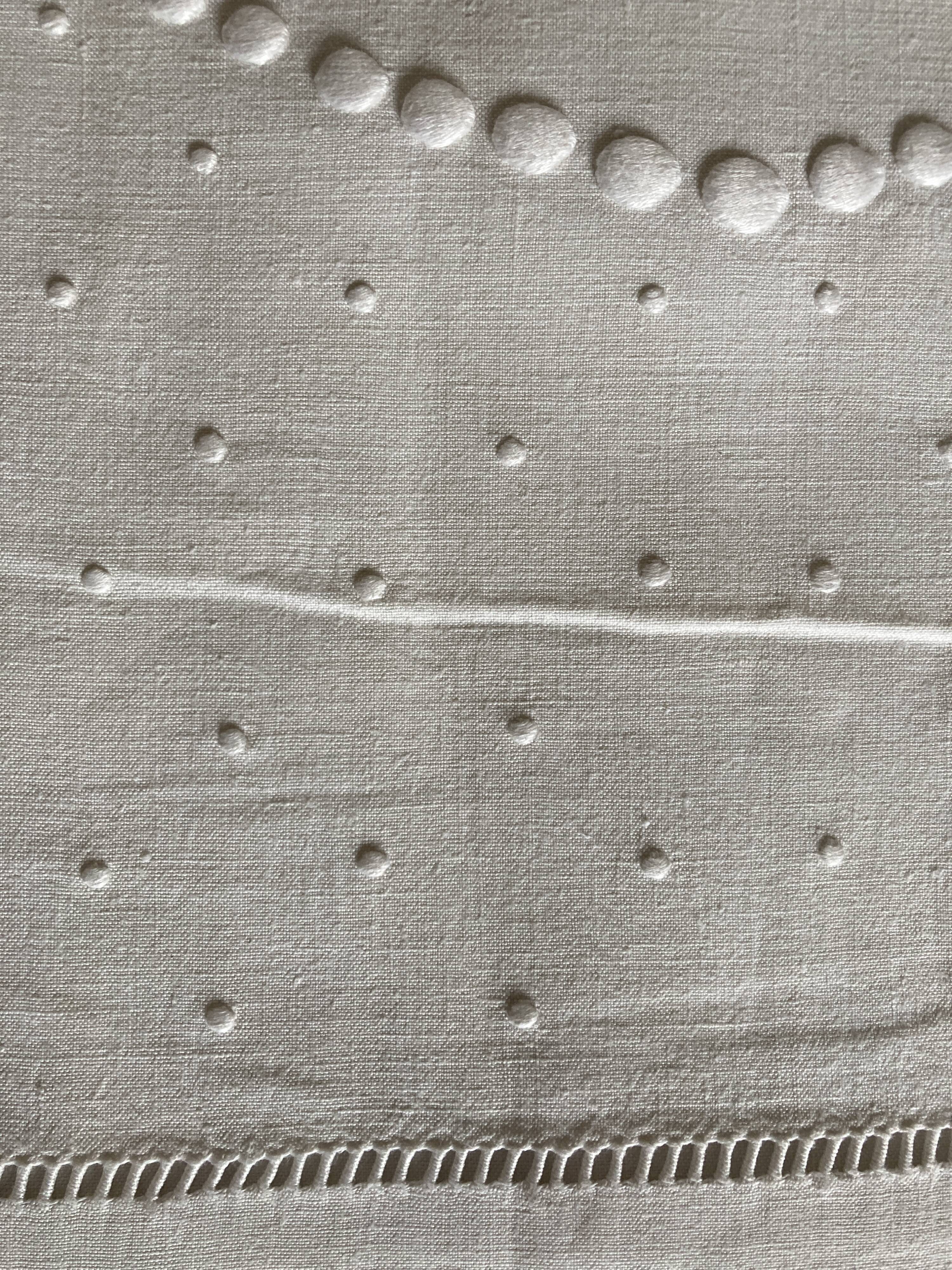 Linen cloth sheet embroidered with a pea festoon