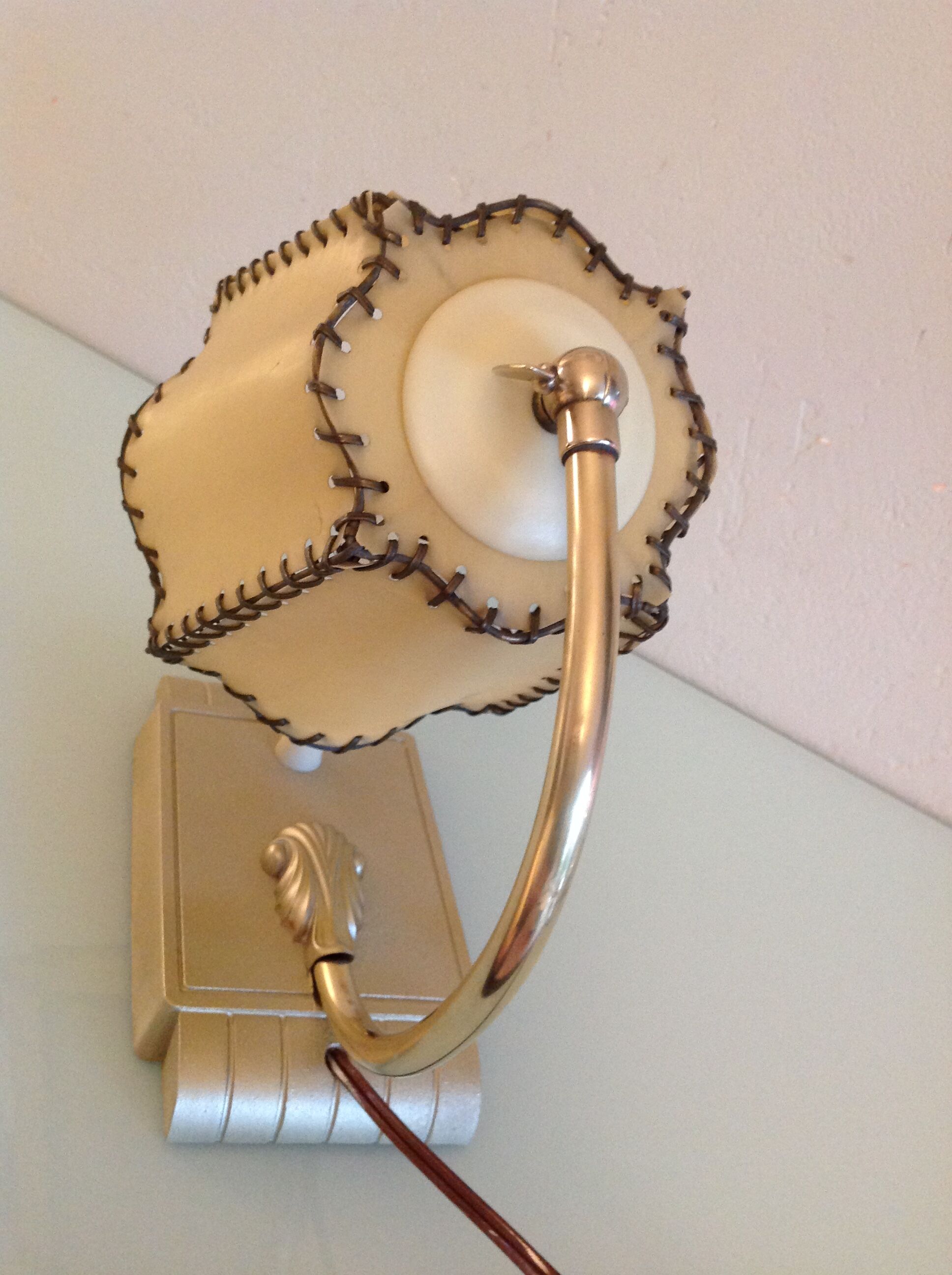 Brass bedside lamp and beige lampshade art deco style
