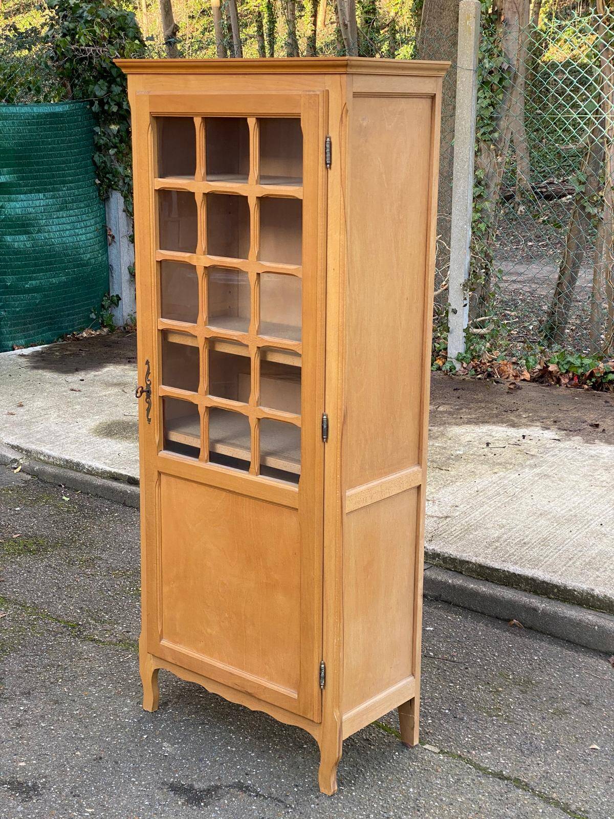 Parisian glass-fronted wardrobe in light wood from the 1960s.