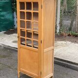 Parisian glass-fronted wardrobe in light wood from the 1960s.