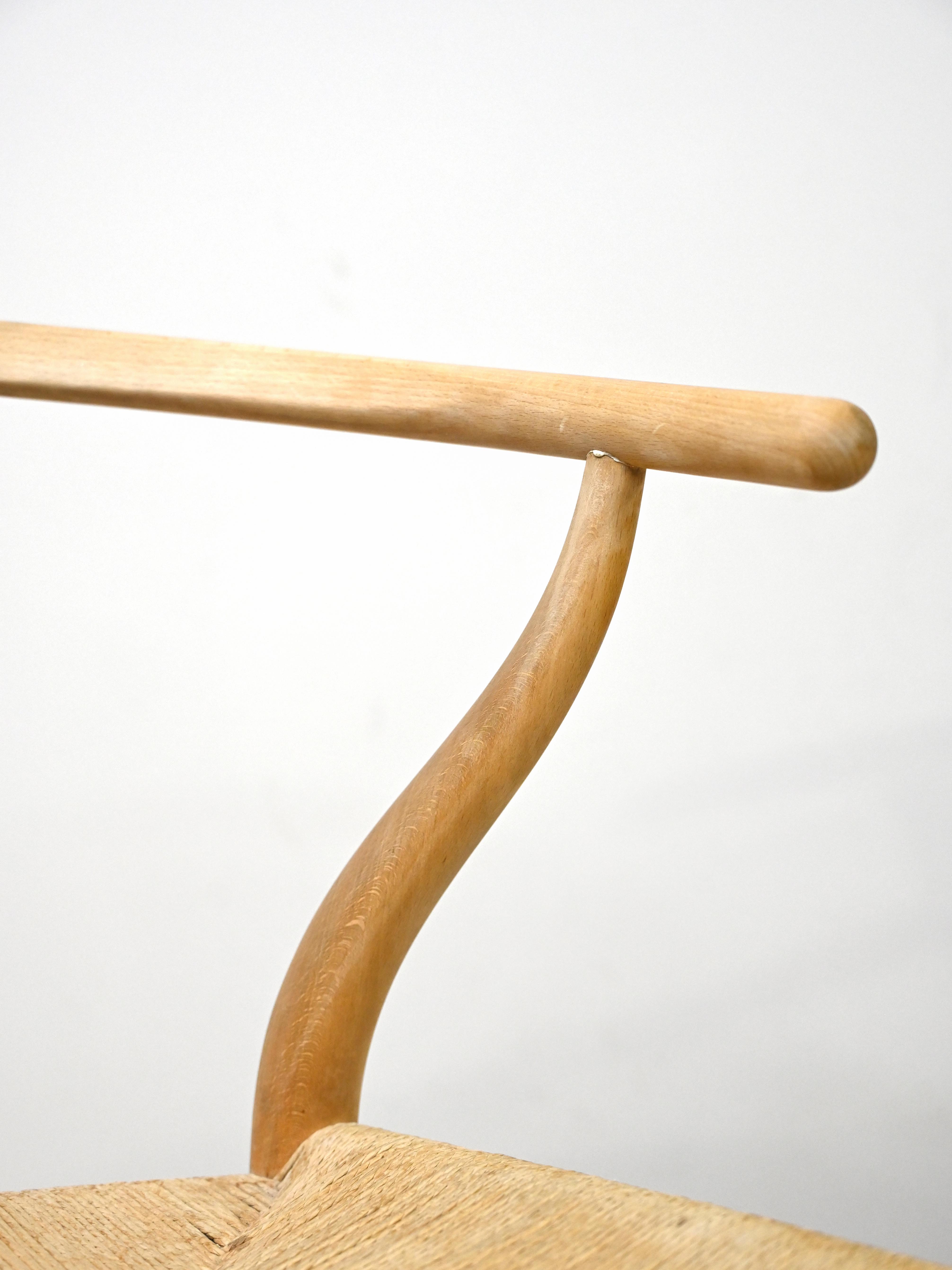 Set of six 'Wishbone chair' model chairs by Hans J. Wegner with leather cushions