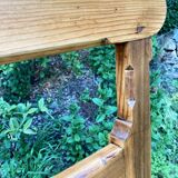 Old wooden bench with backrest, dated 1923