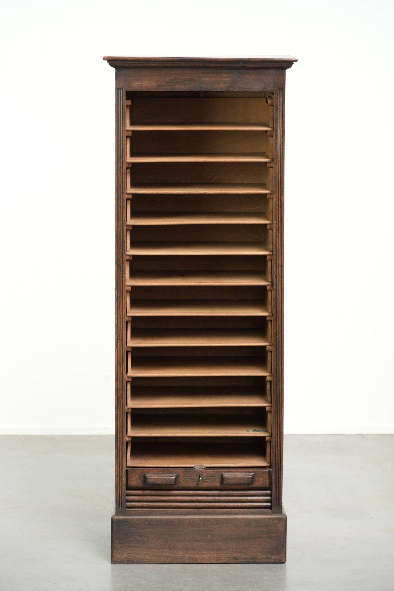 English antique archive cabinet with oak roll-up door from the 20th century