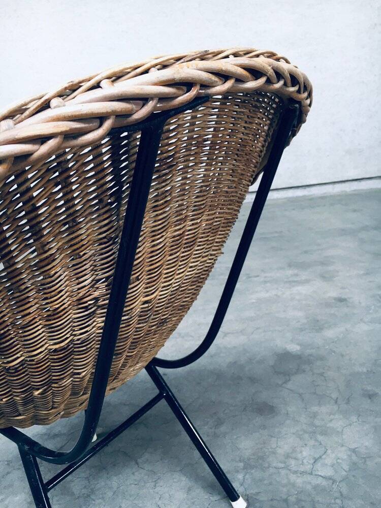 Wicker lounge chair in the style of Dirk Van Sliedregt for Rohé Noordwolde, Netherlands, 1960s.