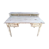 Large wooden desk with patinated bleacher
