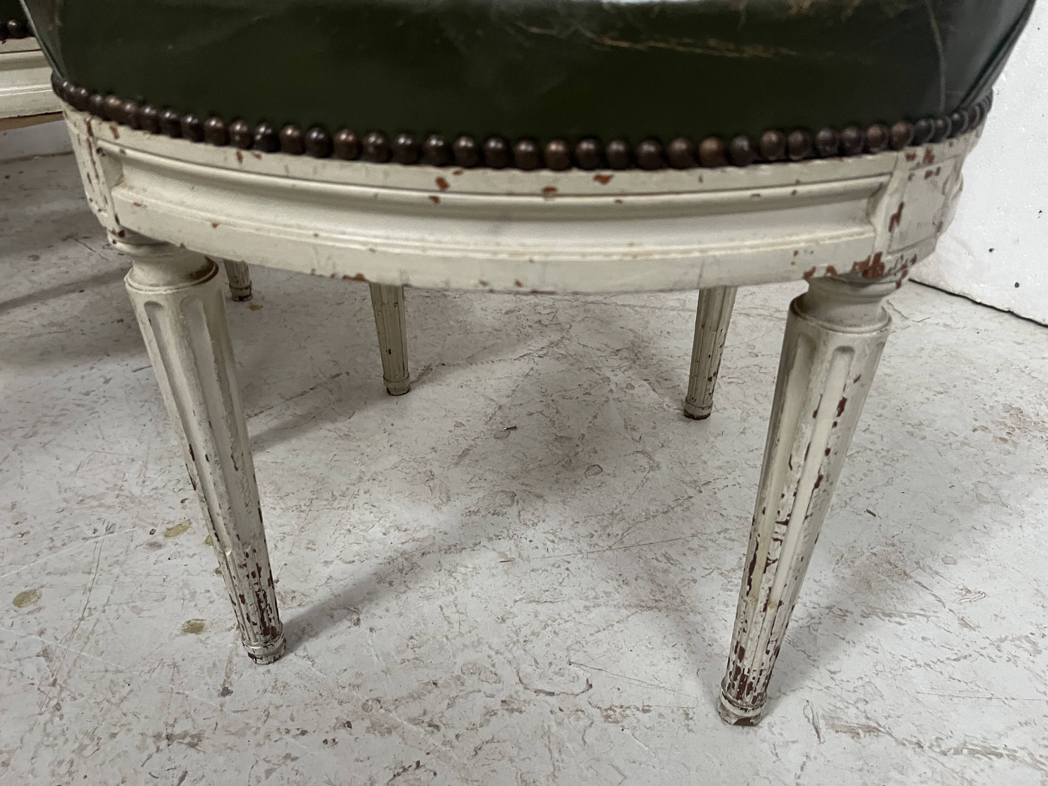 Set of seven Louis XVI style chairs in patinated beech, 20th century.