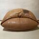 Light leather pouf sofa by Raphael Raffel for Honoré Paris