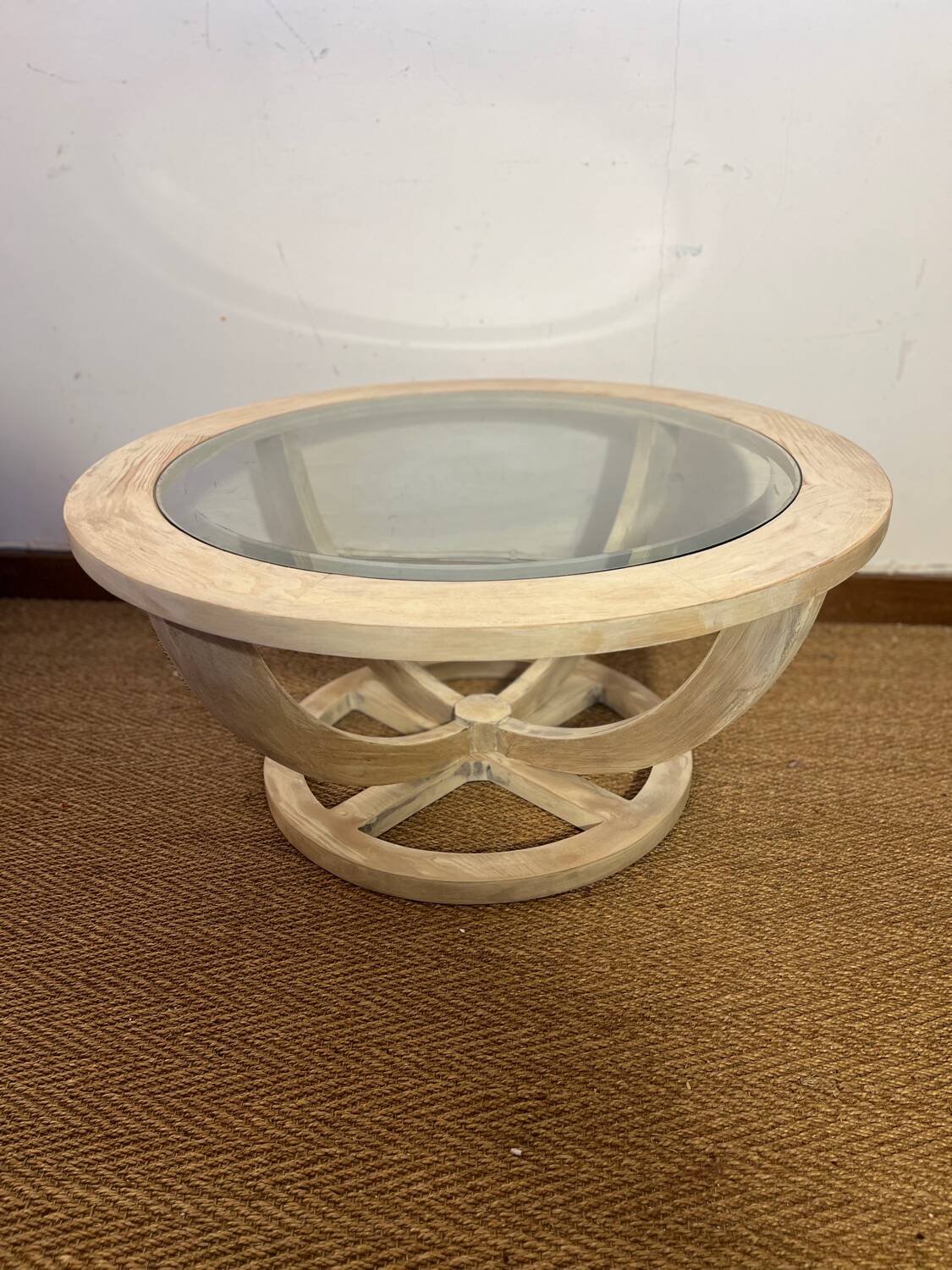 Oval patinated wood and beveled glass coffee table