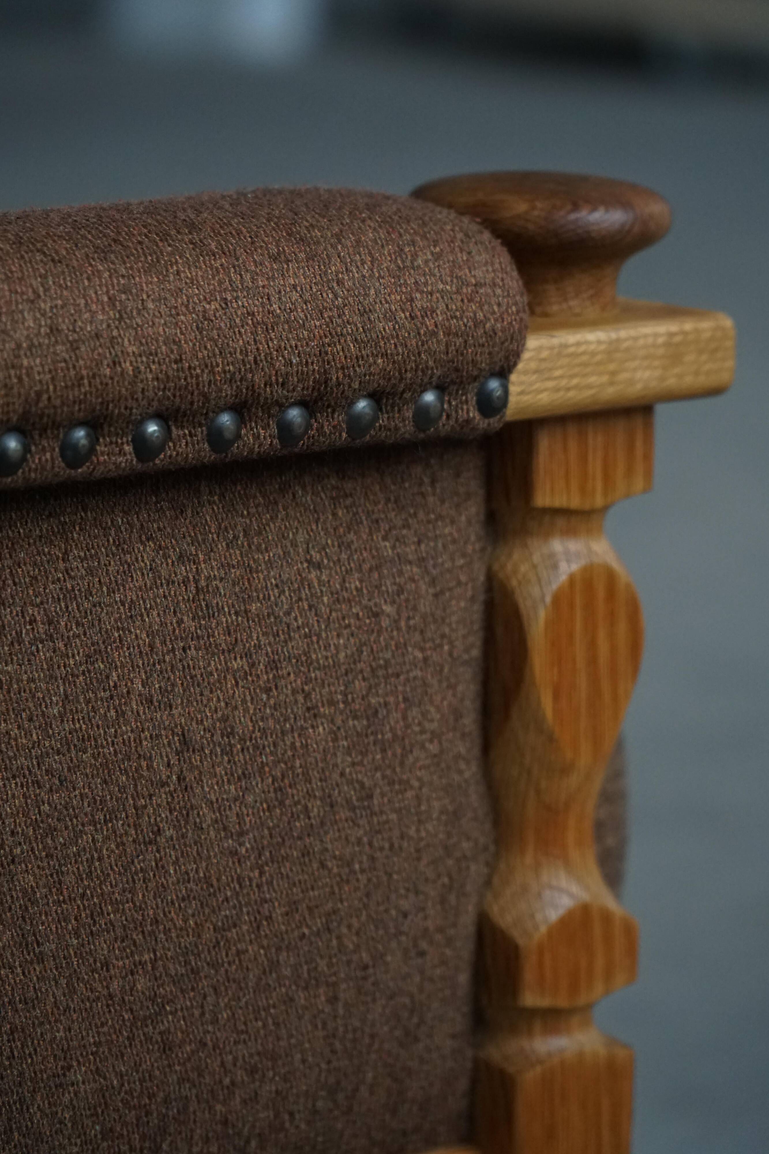 Modern Danish, a pair of lounge chairs in oak and wool, Henning Kjærnulf, 1960s.